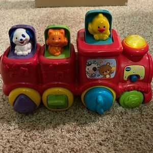 Vtech roll and surprise animal train
